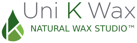 Logo of Uni K Wax Natural Wax Studio. The text is in a combination of gray and green fonts. On the left, there is a green drop-shaped design with the letters "U" and "K" embedded within it.