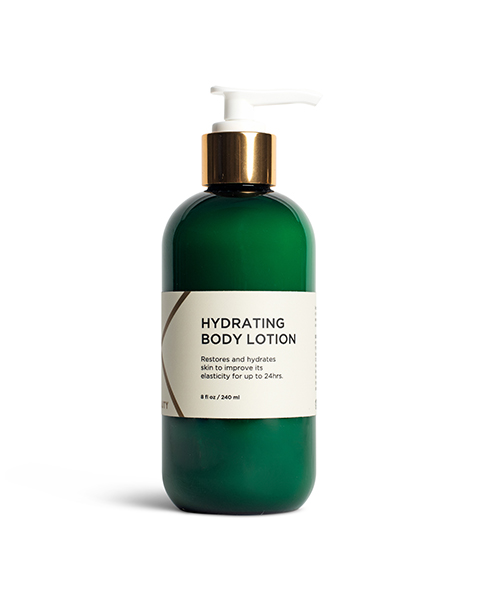 A green bottle of Hydrating Body Lotion with a white and gold pump. The label reads "Hydrating Body Lotion," and mentions that it restores and hydrates skin to improve its elasticity for up to 24 hours. The bottle size is 8 fl oz (240 ml).