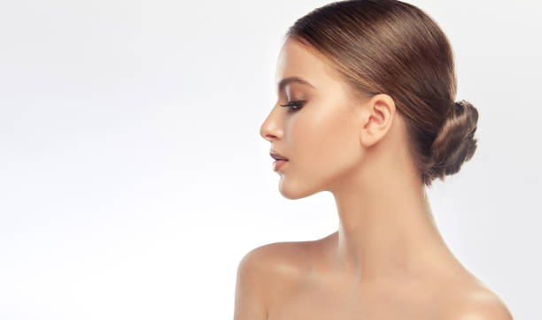 Profile of woman with elegant hairstyle.